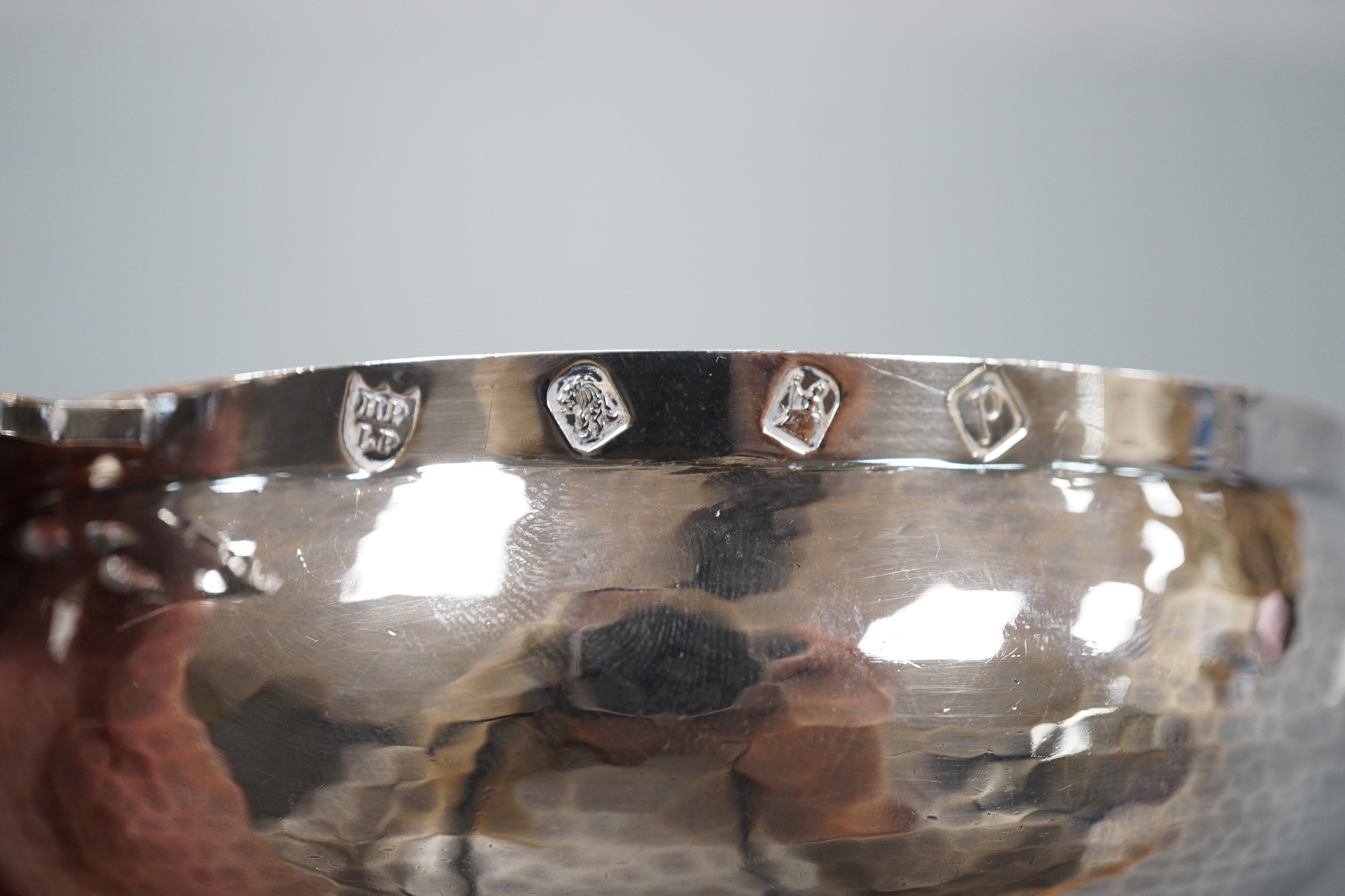 A modern Brittania standard silver bleeding bowl, by Tessiers Ltd, with pierced handle, diameter including handle 19.5cm, 10.5oz.